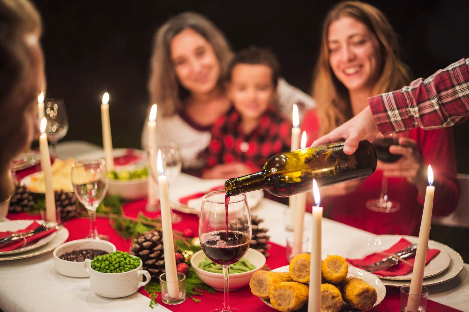 happy family at christmas dinner scaled